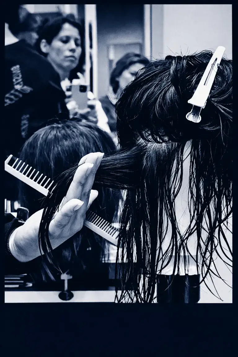 Sectioning and cutting practice during a hairdressing training session